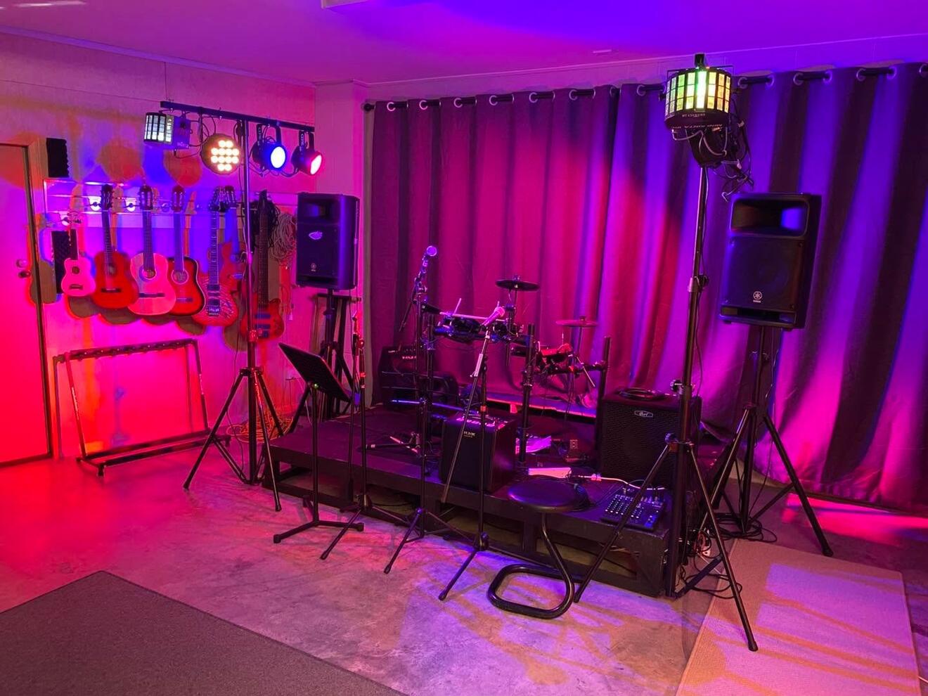 Band practice space with PA and lights
